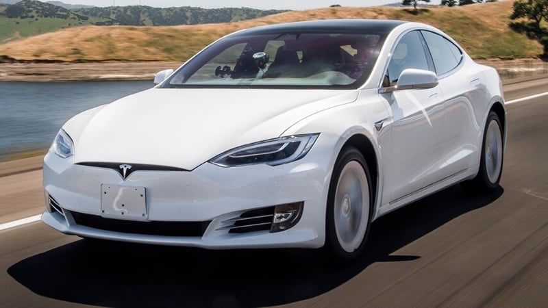 2019 Tesla Model S range road trip front motion view close