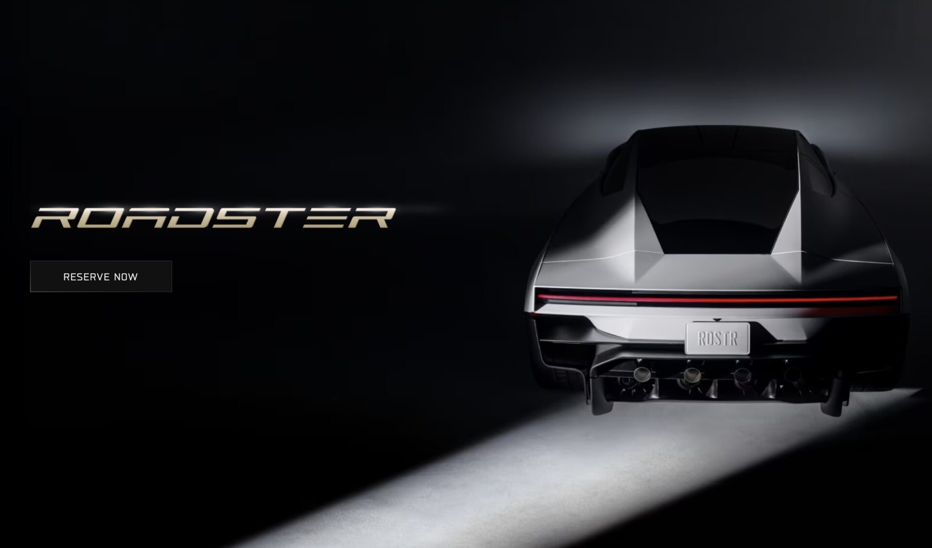 Rear view of a sleek, futuristic car in a dark hero banner with 'ROADSTER' text and a 'RESERVE NOW' button on the left.